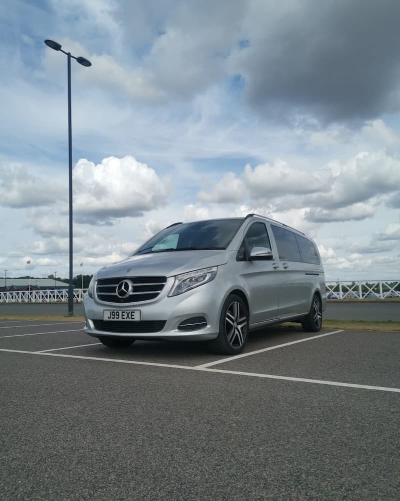 large Mercedes people carrier at docks